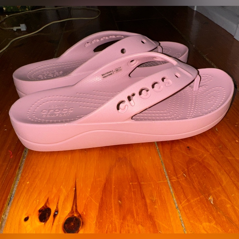 Pink croc flip flops